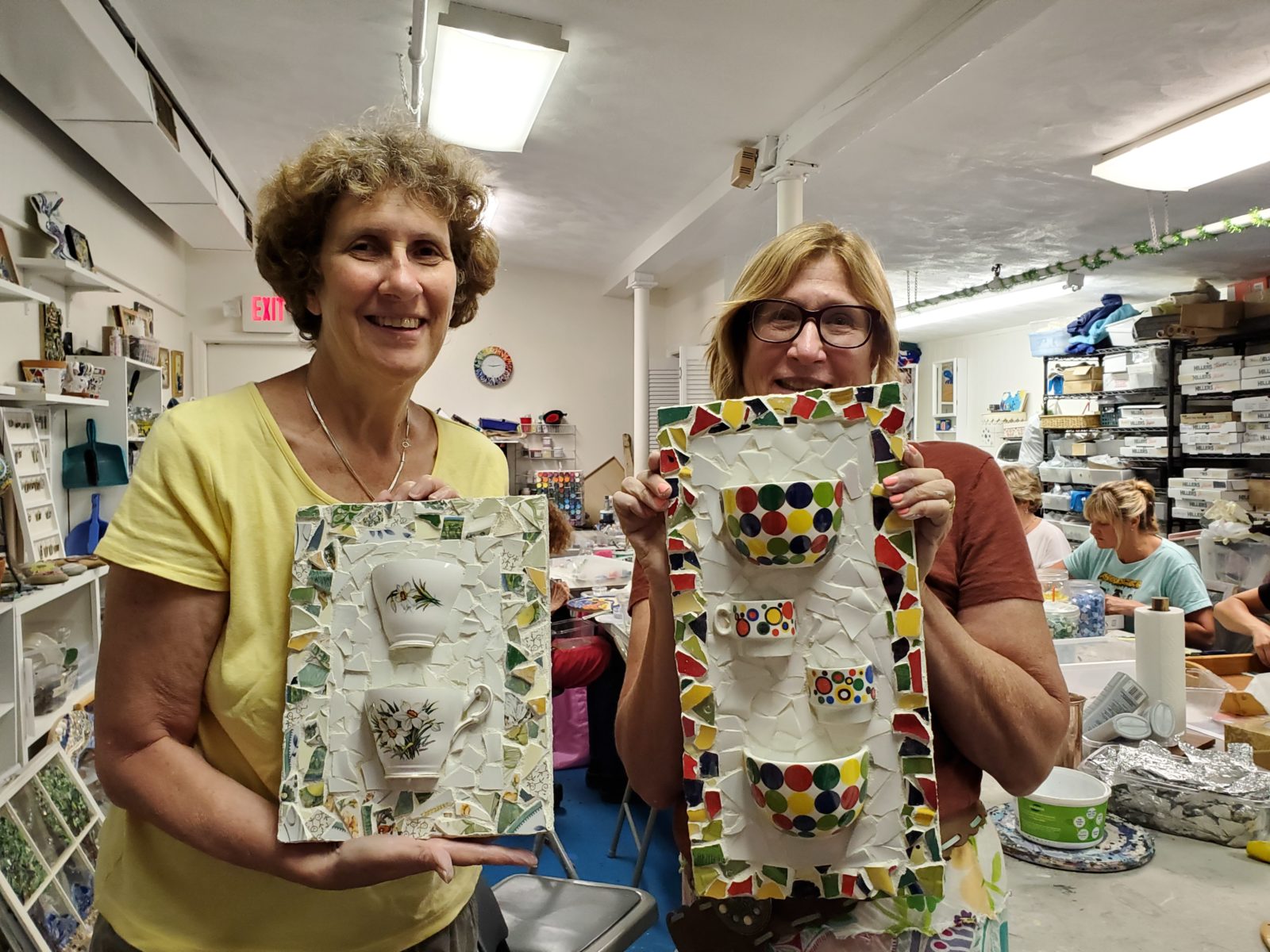 student mosaic art class pottery project